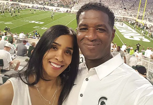 david and terri smith on the football field